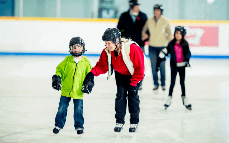 People ice skating together, showing different body postures and movements, creating a sense of community and enjoyment